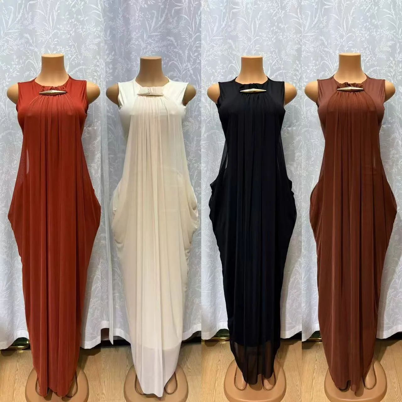 Sleeveless pleated maxi dresses in four colours